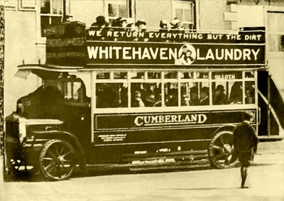 Open topped bus, Whitehaven to Silloth, advertising Whitehaven Laundry, about 1920